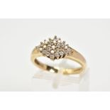 A 9CT GOLD CUBIC ZIRCONIA RING, set with a lozenge of claw set cubic zirconia, to a plain polished