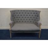 A MODERN STAINED OAK BUTTON BACK LIGHT GRAY TWO SEATER SOFA, with a winged back, width 141cm x depth