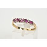 A 9CT GOLD HALF HOOP RING, set with five marquise cut rubies interspaced with six single cut
