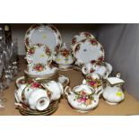 A QUANTITY OF ROYAL ALBERT OLD COUNTRY ROSES TEA AND DINNERWARES, mostly seconds, tea plates and