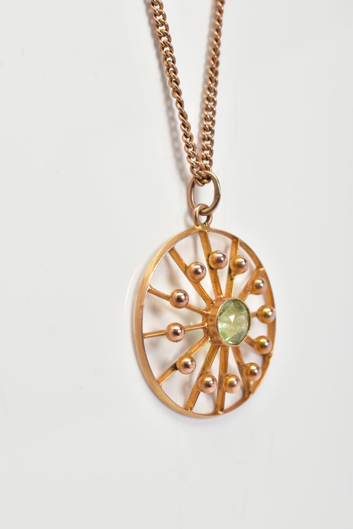 AN OPENWORK PENDANT NECKLACE, the circular openwork panel pendant set with a central circular cut - Image 3 of 4