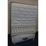 A SILENT NIGHT 4' 6'' MATTRESS, on an older divan base and a white headboard