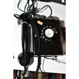 A WEIDMANN BLACK BAKELITE WALL MOUNTED TELEPHONE, model No.4259, twin bells to top, original braided
