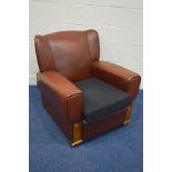 AN ART DECO RED LEATHERETTE CLUB CHAIR, with reeded oak fronted armrests, with a later charcoal