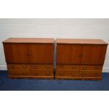TWO MODERN CHERRYWOOD DOUBLE BI FOLD CABINETS, with four drawers, one cabinet with four open