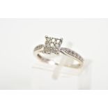 A 9CT WHITE GOLD DIAMOND RING, designed with a central square panel set with nine round brilliant