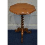 A 20TH CENTURY PITCH PINE OCTAGONAL TRIPOD TABLE on a barley twist support