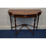 A REPRODUCTION MAHOGANY AND STRUNG SEPENTINE HALL TABLE, with concave front corners, single frieze
