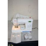 A JANOME 8077 ELECTRIC SEWING MACHINE with foot pedal, instructions, a soft cover and a bag of