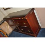 A STAINED PINE LONG CHEST OF FOUR DRAWERS, with brass pull handles, 152cm wide x 50cm deep x 90cm