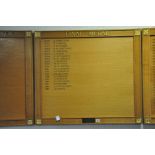 AN OAK FACED HONOURS BOARD, with gilt rose bosses to each corner with a presentation plaque in