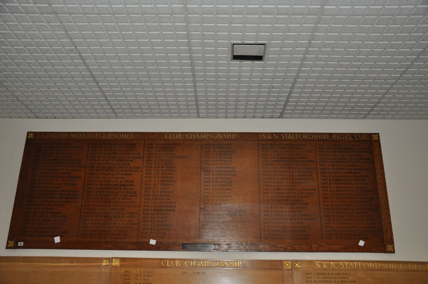 AN OAK FACED HONOURS BOARD, with gilt rose bosses to each corner, Winners of Jacob Mixed Foursomes