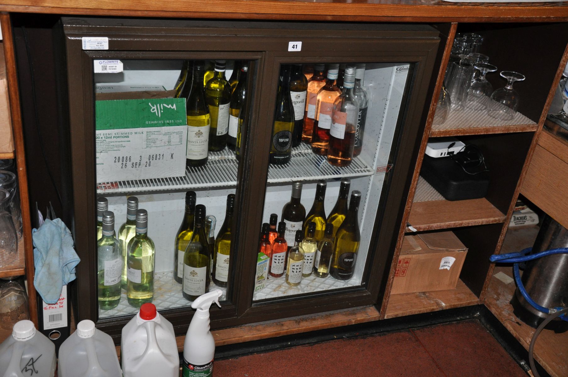 A FLOWRITE BOTTLE FRIDGE, with two sliding glass doors, 89cm wide x 54cm deep x 90cm high