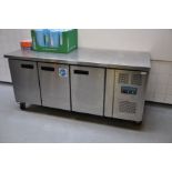 A POLAR REFRIGERATION STAINLESS STEEL CHILLER, with three compartments and on wheels, 179cm wide x