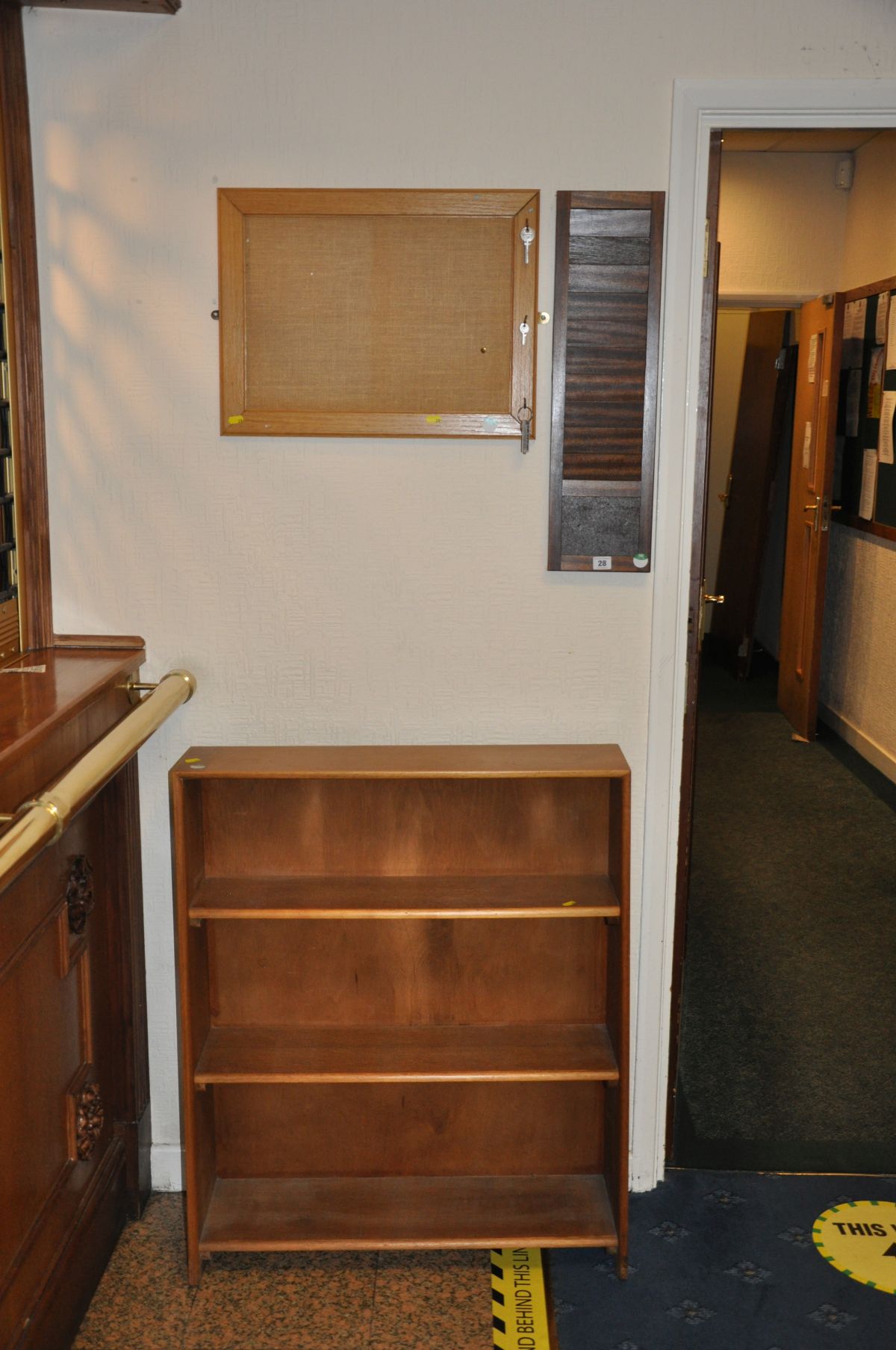 A MID CENTURY OAK BOOKCASE, 75cm wide x 23cm deep x 90cm high, a hanging card holder and a small