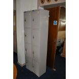 THREE METAL FOUR DOOR LOCKERS, with only six of the twelve keys each unit, 30cm wide x 30cm deep x