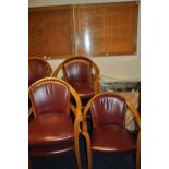 A SET OF SIX BEECHWOOD AND RED LEATHER CLUB CHAIRS, (some have loose joints but leather in very good