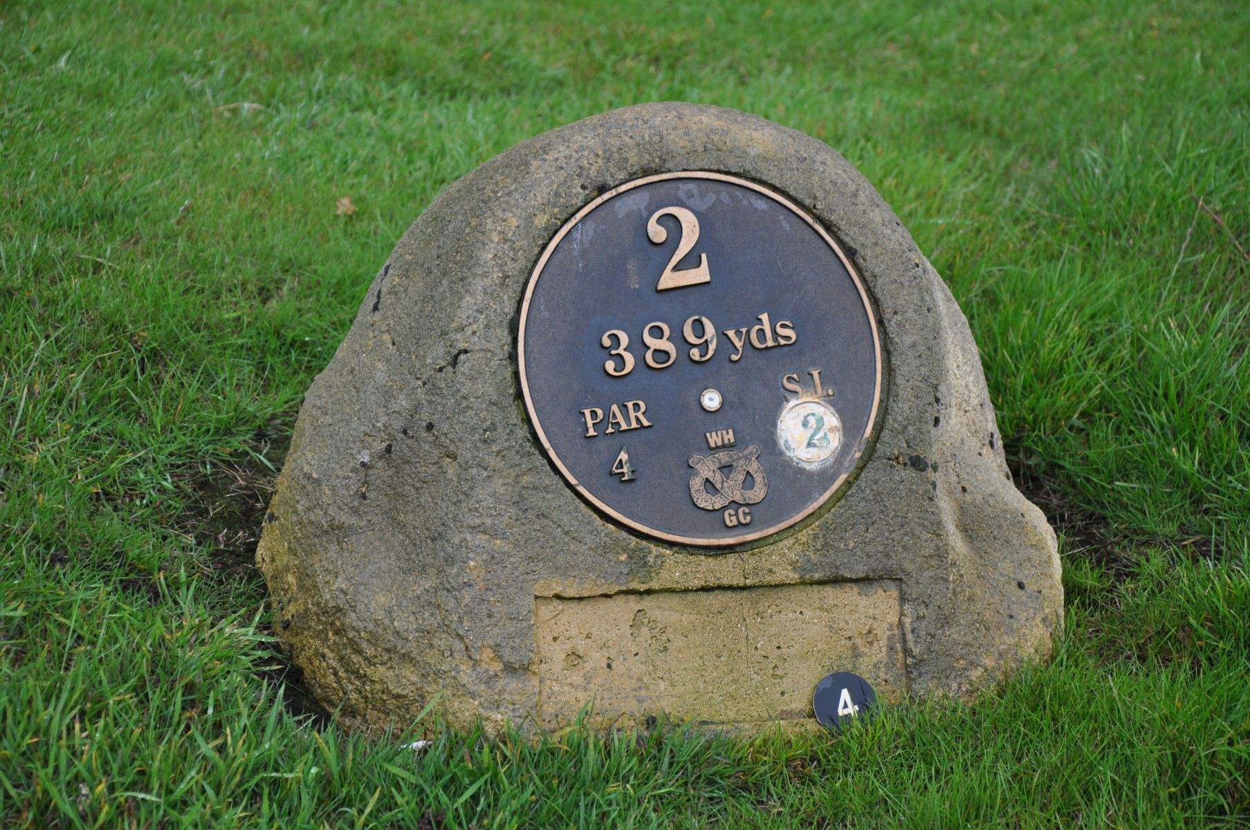 THE WHITE TEE MARKER FOR HOLE TWO