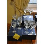 A SET OF SIX CRYSTAL WINE GLASSES, (matching Lot 125) and a set of four crystal glasses of a