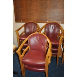 A SET OF BEECHWOOD AND RED LEATHER CLUB CHAIRS, (some have loose joints but leather in very good