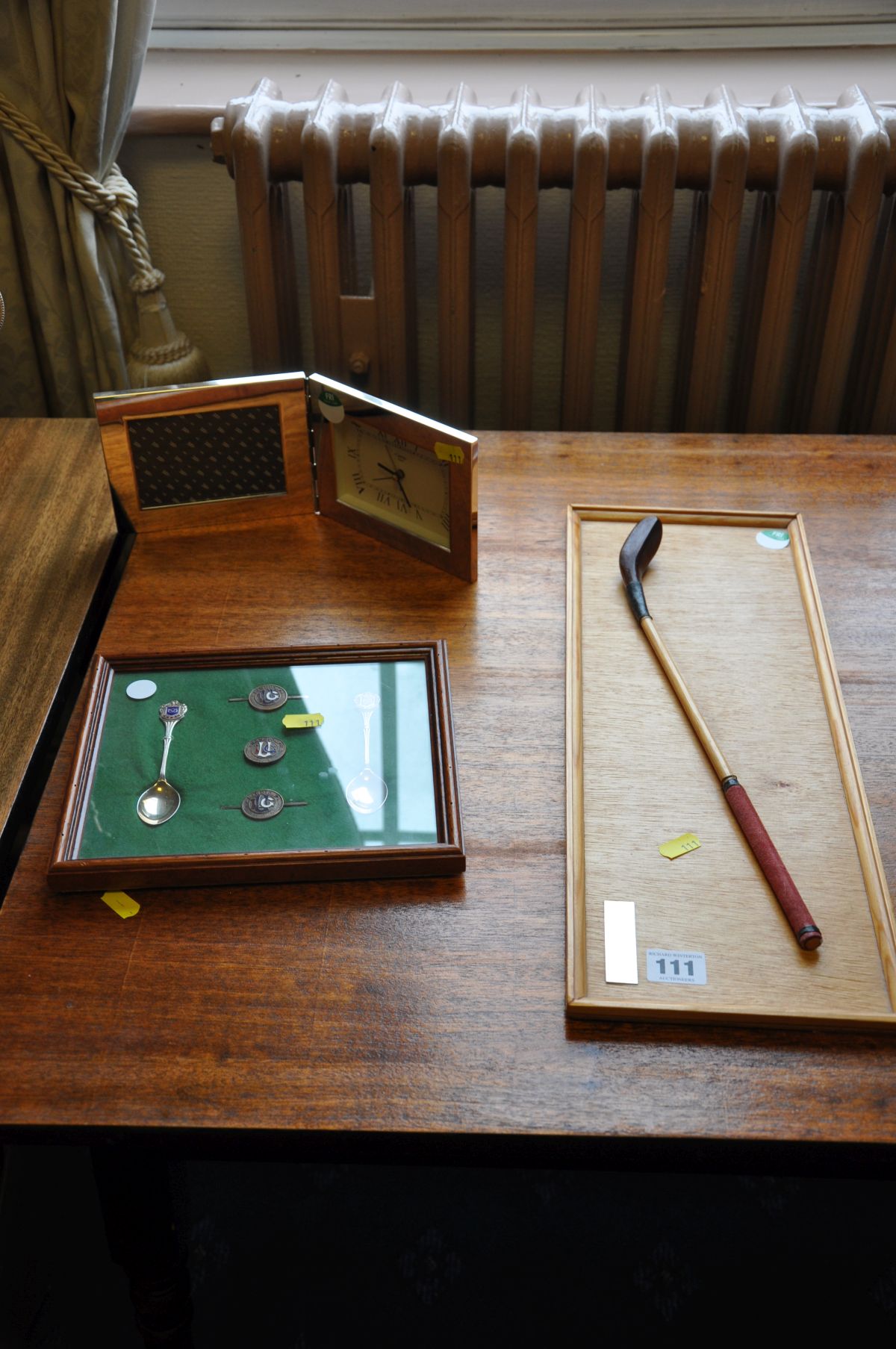 A FRAMED PAIR OF WHITTINGTON BARRACKS GOLF CLUB SPOONS, and three pins with Handicap engraved into