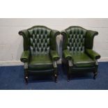 A PAIR OF MODERN GREEN LEATHER BUTTONED WING BACK ARMCHAIRS, both with a pair of stools, on cabriole