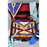 A BRIEFCASE CONTAINING MASONIC REGALIA, to include aprons, books, medallions and a pair of 9ct