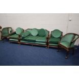 AN EARLY 20TH CENTURY MAHOGANY FIVE PIECE PARLOUR SUITE, with a carved birds head to each armrest,