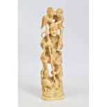 A LATE/EARLY 20TH CENTURY CARVED IVORY FIGURE OF A CORMORANT FISHERMAN, with a boy and cormorant