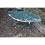 A GREEN PAINTED CAST ALUMINIUM OVAL GARDEN TABLE, with a pierced fretwork top with foliate detail,