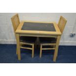 A MODERN BEECH RECTANGULAR KITCHEN TABLE with a black marble insert and two chairs (3)