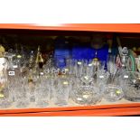 A GROUP OF CUT AND PRESSED GLASS etc to include whisky glasses, champagne flutes, Wordsley Crystal