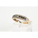 A 9CT GOLD HALF HOOP DIAMOND RING, designed with a central row of brilliant cut black diamonds, with