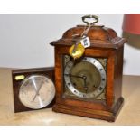 AN ELLIOT OF LONDON BURR WALNUT VENEERED BRACKET CLOCK, eight day movement, gong strike, Arabic