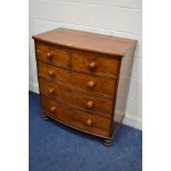 A VICTORIAN WALNUT BOWFRONT CHEST OF TWO OVER THREE LONG DRAWERS, with turned handled on baluster