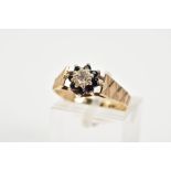 A 9CT GOLD SAPPHIRE AND DIAMOND CLUSTER RING, designed with a central single cut diamond and a