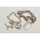 TWO WHITE METAL BRACELETS, the first a rolo link bracelet suspending two heart charms to a T bar