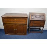 AN EARLY TO MID 20TH CENTURY OAK BUREAU with two drawers, width 74cm x depth 37cm x height 104cm