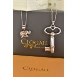 TWO SILVER CLOGAN PENDANTS, a large key pendant with rose gold detail and a smaller elephant pendant