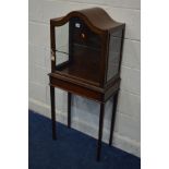 AN EDWARDIAN MAHOGANY SINGLE DOOR DISPLAY CABINET on a stand, width 57cm x depth 31cm x height 128cm