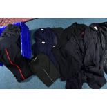 A LARGE BLUE BIN CONTAINING VARIOUS ITEMS OF MILITARY CLOTHING, sweaters (NATO) shirts, trousers