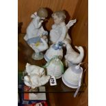 SIX LLADRO PORCELAIN FIGURES AND CHRISTMAS BELLS AND TWO NAO DUCK FIGURES, including bells dated