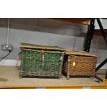 TWO VINTAGE WICKER FISHING BASKETS, the larger is over painted green with a shoulder strap, width