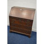 A GEORGIAN OAK AND BANDED BUREAU, with a fitted interior, six exterior drawers, on bracket feet,