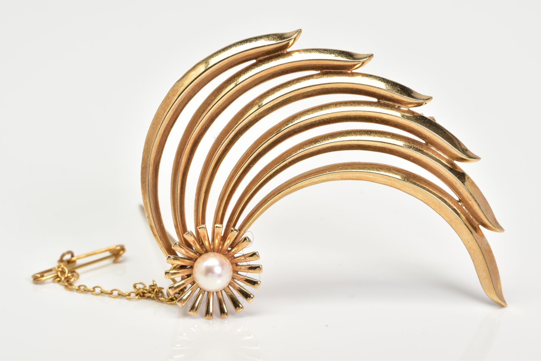 A 9CT GOLD PEARL BROOCH, designed with six curved openwork panels set with a single cultured pearl