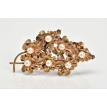 A 9CT GOLD FLORAL PEARL BROOCH, designed with six gold leaves each set with a single cultured pearl,