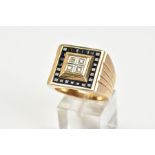 A 9CT GOLD SAPPHIRE AND DIAMOND SIGNET RING, designed with a square panel to the centre are four