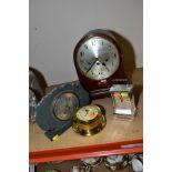 A BOWDEN & SONS DOME TOPPED MAHOGANY CASED MANTEL CLOCK, standing on brass bun feet, having silvered