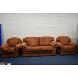 A RUSSETT AND GOLD UPHOLSTERED THREE PIECE LOUNGE SUITE, comprising a two seater settee, width 198cm