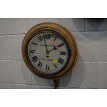 AN EARLY 20TH CENTURY CIRCULAR WALL CLOCK by Swindon and Sons, Birmingham with single fusee